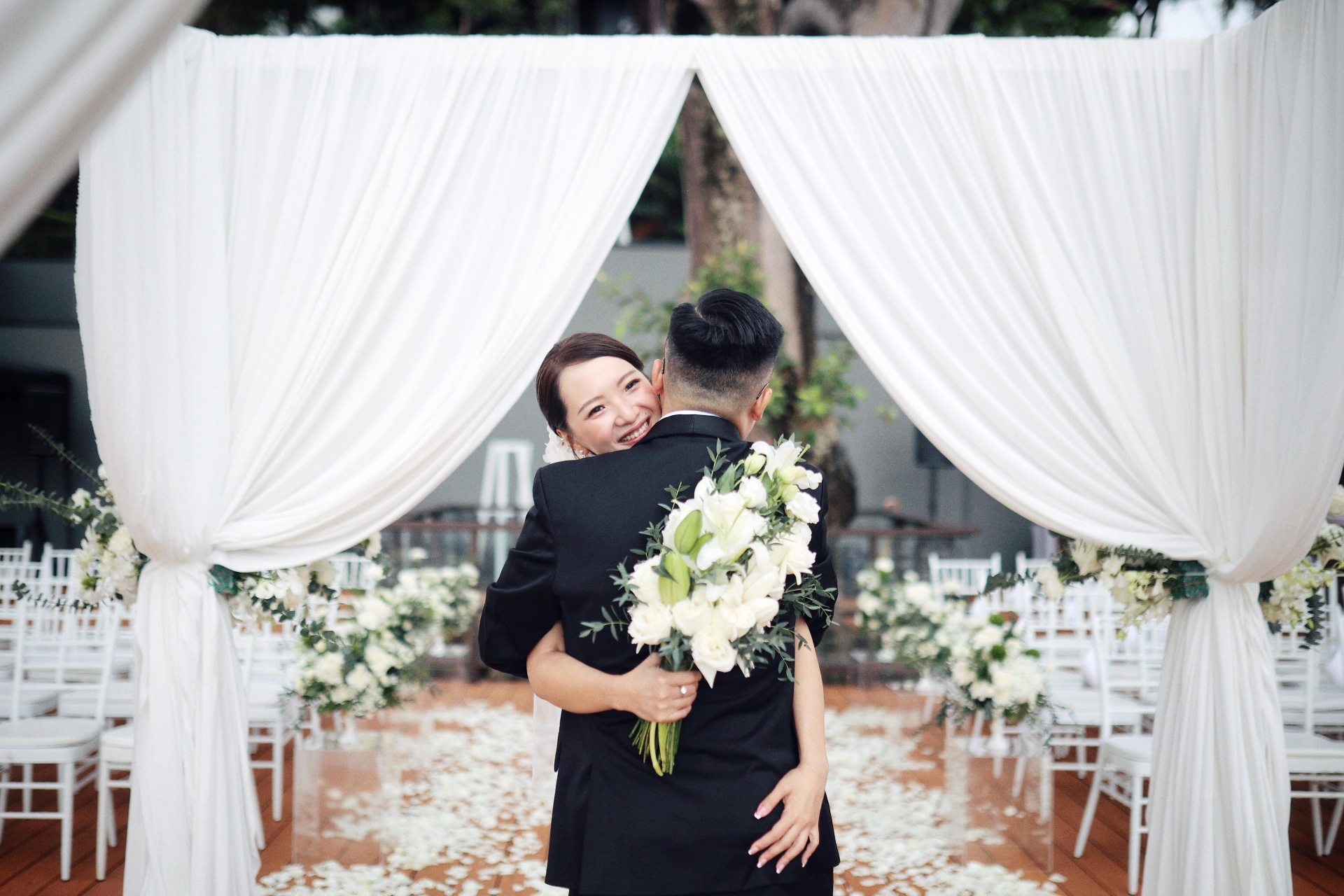 Joyful embrace at the altar
